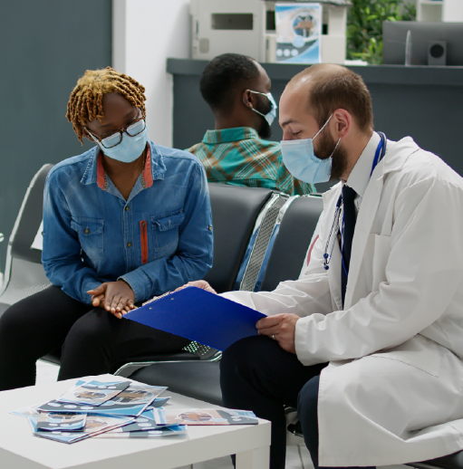 woman-talking-with-physician-at-a-hospital